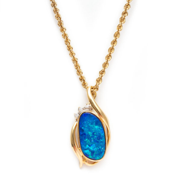 Black Opal and Diamond Pendant Necklace in 14 Karat Yellow Gold - Image 1