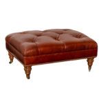 Brown Leather Button Tufted Ottoman with Nailhead Trim on Casters