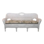 White Vinyl Outdoor Wicker Style Sofa With Tropical Print Seat Cushions