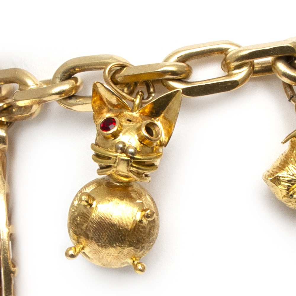 Lot - 14-Karat Yellow-Gold Charm Bracelet with Two 14-Karat Gold Charms and  Five Gold Filled Charms, 41 total gross dwt.