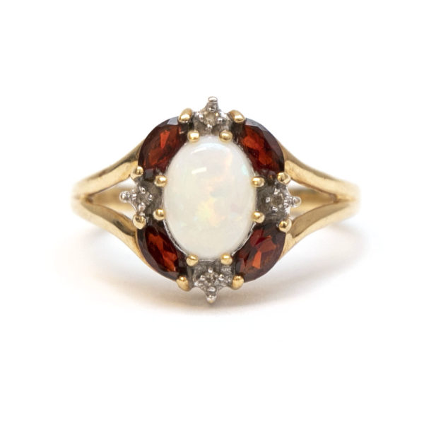 Opal, Garnet, and Diamond Accent Ring in 10 Karat Gold - Image 1