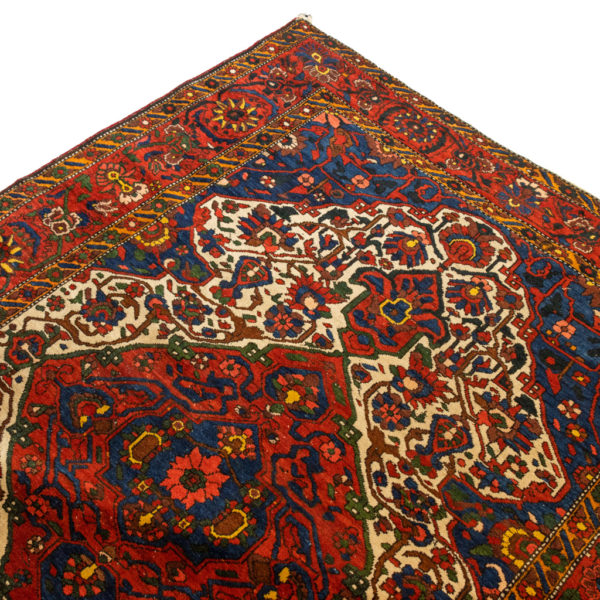 5’4” x 6’9” Hand Knotted Persian Wool Rug in Red - Image 1