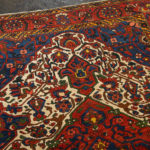 5’4” x 6’9” Hand Knotted Persian Wool Rug in Red - Image 3