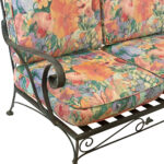 Vintage Wrought Iron Outdoor Sofa with Floral Cushions - Image 4