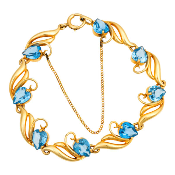 14 Karat Gold Swirl Bracelet with 8 Heart Shaped Synthetic Spinels - Image 1