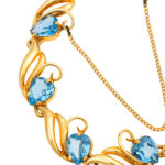 14 Karat Gold Swirl Bracelet with 8 Heart Shaped Synthetic Spinels - Image 2