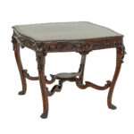 Heavily Carved Mahogany Parlor Table with Old Man of the North Motif