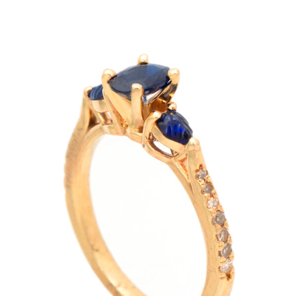 Sapphire and Diamond Ring with Carved Leaf Accents in 14 Karat Gold - Image 2