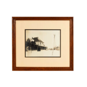 Antique Black and White Print of a Couple and Snowy Farmhouse