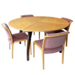 Vintage Round Convertible Pale Wood Dining Table on Dark Legs with 7 Chairs