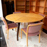 Vintage Round Convertible Pale Wood Dining Table on Dark Legs with 7 Chairs - Image 4