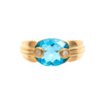 6 Carat Blue Topaz Ring with Diamond Accents in 18 Karat Gold