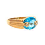 6 Carat Blue Topaz Ring with Diamond Accents in 18 Karat Gold - Image 4
