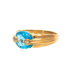 6 Carat Blue Topaz Ring with Diamond Accents in 18 Karat Gold - Image 6