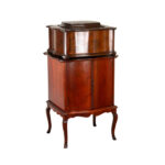 Antique REGINA Double Comb Disc Music Box in Serpentine Mahogany Cabinet